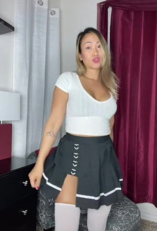 3. Sweetie Atqofficial Shows Cleavage in White Crop Top