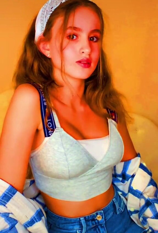 1. Erotic Charlotte M Shows Cleavage in Blue Crop Top