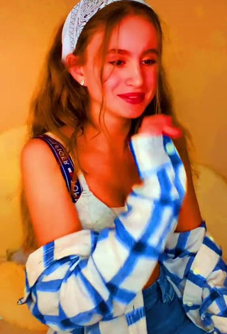 Erotic Charlotte M Shows Cleavage in Blue Crop Top