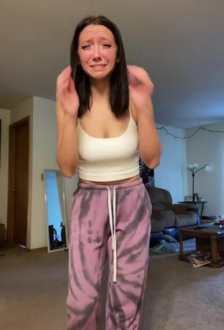 Erotic Jaime Shows Cleavage in White Crop Top