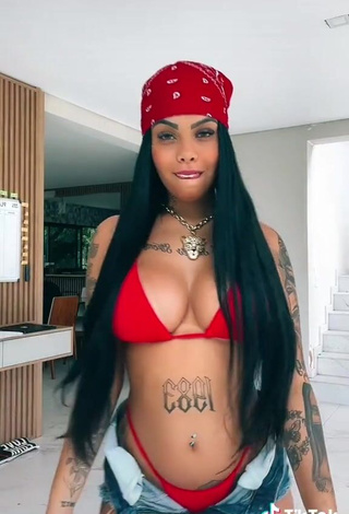 Irresistible Nathi Rodrigues Shows Cleavage in Red Bikini