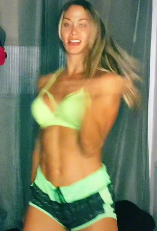 Erotic Ingrid Vasconcelos Shows Cleavage in Light Green Bikini Top