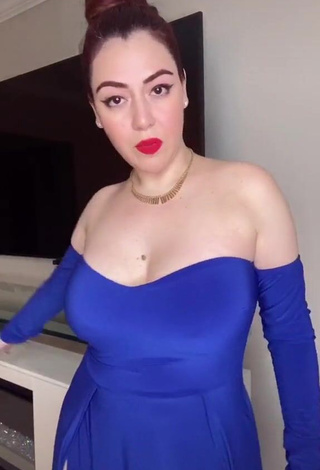 1. Irresistible Jane Rocci Shows Cleavage in Blue Dress