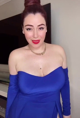 Irresistible Jane Rocci Shows Cleavage in Blue Dress