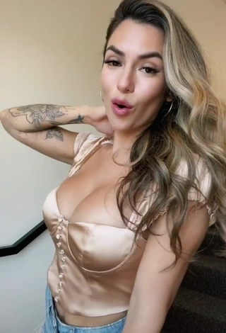 1. Wonderful Luciana DelMar Shows Cleavage in Beige Crop Top