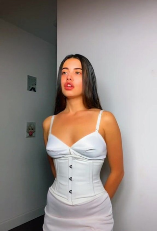 3. Irresistible Morgan Cohen Shows Cleavage in White Dress