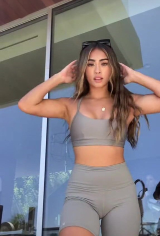 1. Erotic Savannah Palacio Shows Cleavage in Grey Sport Bra
