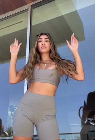 3. Erotic Savannah Palacio Shows Cleavage in Grey Sport Bra