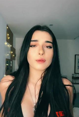 3. Erotic Sofia Crisafulli Shows Cleavage in Black Bikini Top