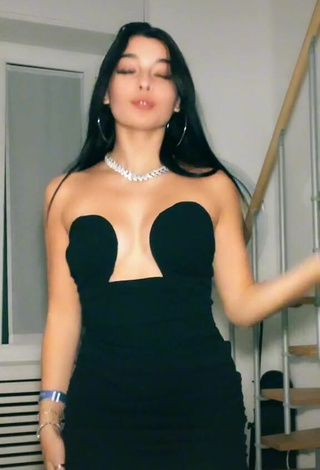 1. Captivating Sofia Crisafulli Shows Cleavage in Black Dress