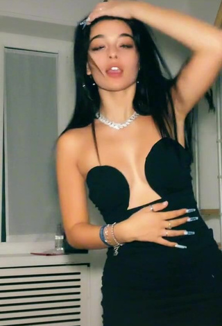 3. Captivating Sofia Crisafulli Shows Cleavage in Black Dress