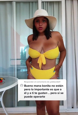 1. Hot Adelaida Tassoni Shows Cleavage in Yellow Bikini