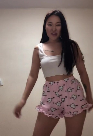 Irresistible Arzhaana Shows Cleavage in White Crop Top