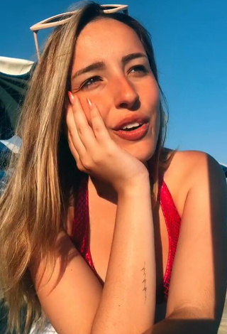 Sexy Beatrice Cossu Shows Cleavage in Red Bikini Top at the Beach