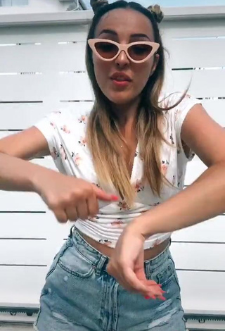 Sweetie Beatrice Cossu Shows Cleavage in Floral Crop Top