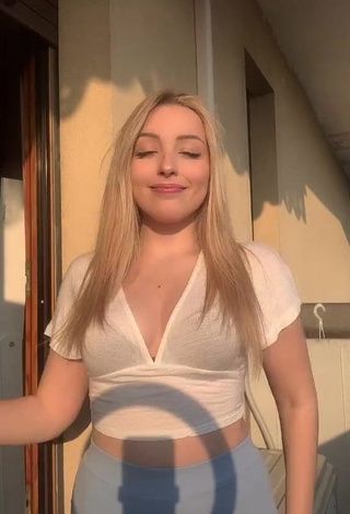 3. Hottest Beatrice Cossu Shows Cleavage in White Crop Top