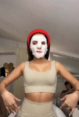 1. Amazing Corinne Pino Shows Cleavage in Hot Beige Crop Top