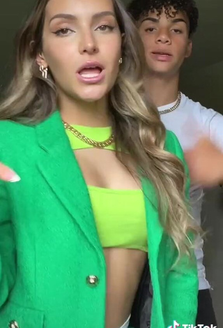 3. Erotic Corinne Pino Shows Cleavage in Green Crop Top