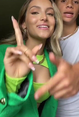 1. Alluring Corinne Pino Shows Cleavage in Erotic Green Crop Top