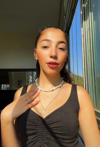 Irresistible Cynthia Basbous Shows Cleavage in Black Crop Top
