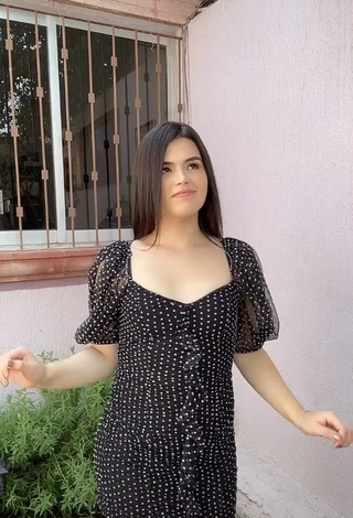 1. Erotic Elvira Shows Cleavage in Polka Dot Dress
