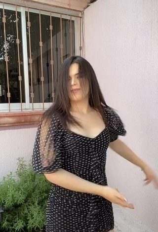 3. Erotic Elvira Shows Cleavage in Polka Dot Dress