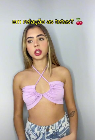 1. Erotic Eve Cardoso Shows Cleavage in Purple Crop Top