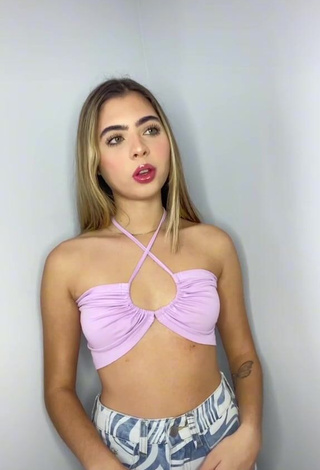 Erotic Eve Cardoso Shows Cleavage in Purple Crop Top