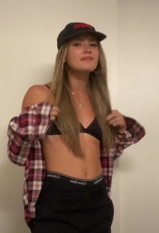 Erotic Abby Fenwick Shows Cleavage in Black Bikini Top