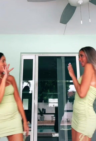 1. Hottie Jada Jenkins Shows Cleavage in Olive Dress