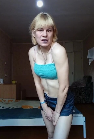 1. Captivating Katya Maksymova Shows Cleavage in Green Crop Top