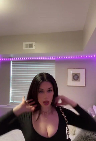 Beautiful Maia Kvitashvili Shows Cleavage in Sexy Black Crop Top