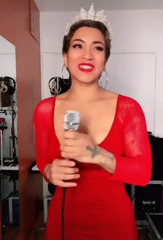 Hottie Paula Arias Shows Cleavage in Red Dress