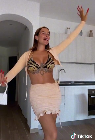 Erotic Raffaela Zollo Shows Cleavage in Bikini Top and Bouncing Boobs