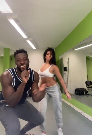 Beautiful Sabrine Khan Shows Cleavage in Sexy White Sport Bra