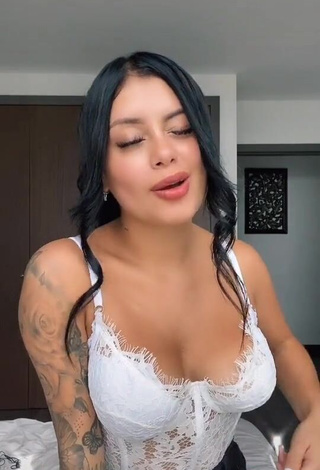 3. Erotic Tatia Ortega Shows Cleavage in White Bodysuit