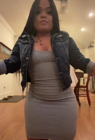 1. Erotic Amanda Salinas Shows Cleavage in Grey Dress