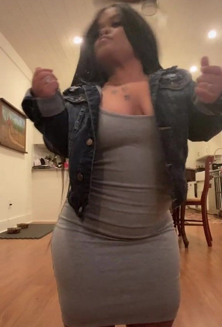Erotic Amanda Salinas Shows Cleavage in Grey Dress