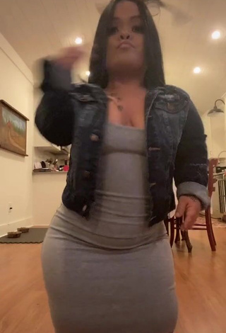 3. Erotic Amanda Salinas Shows Cleavage in Grey Dress