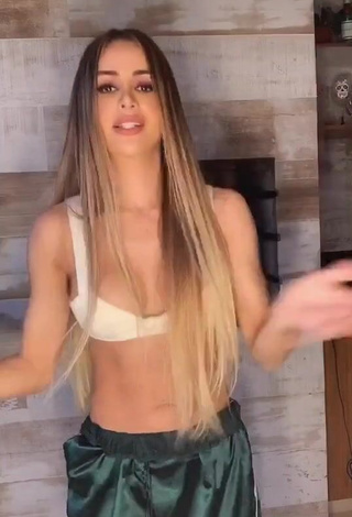 3. Hot Késia Muniz de Oliveira Shows Cleavage in White Bikini Top