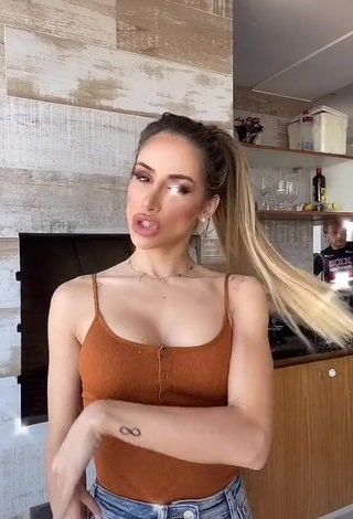 1. Cute Késia Muniz de Oliveira Shows Cleavage in Brown Top