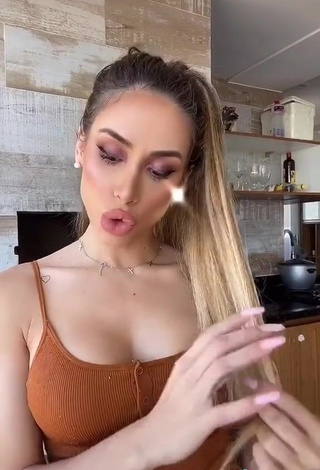 3. Cute Késia Muniz de Oliveira Shows Cleavage in Brown Top