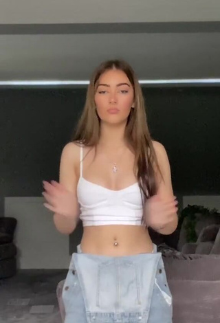 Cute Emily Steers Shows Cleavage in White Crop Top