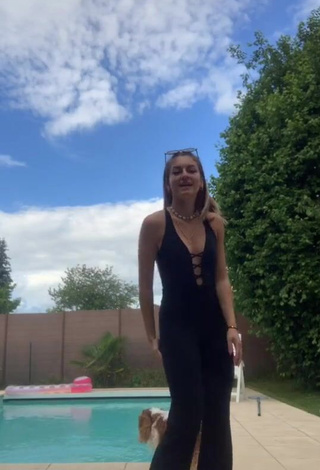 1. Erotic EstelleTvo Shows Cleavage in Black Overall at the Swimming Pool