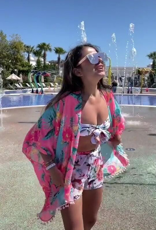 Captivating Ezgi Gizem Akdogan in Floral Bikini Top at the Swimming Pool