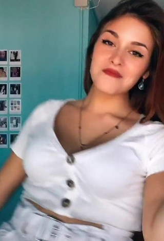 Irresistible Helen Riu Shows Cleavage in White Crop Top