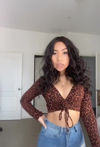 1. Seductive Jazlyn G Shows Cleavage in Leopard Crop Top