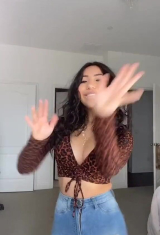 2. Seductive Jazlyn G Shows Cleavage in Leopard Crop Top