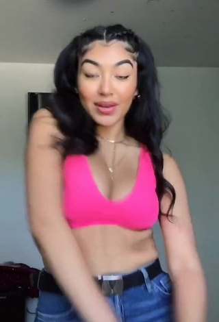 Seductive Jackie Ybarra Shows Cleavage in Pink Crop Top