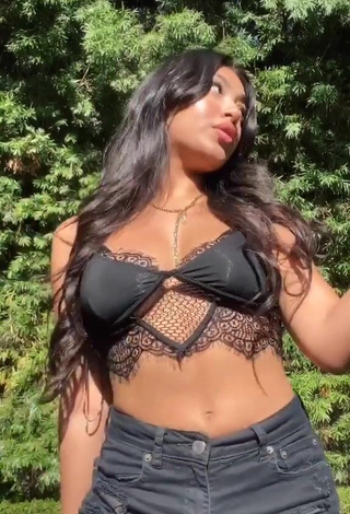 3. Jackie Ybarra in Alluring Black Crop Top